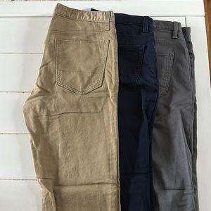 Three pairs of Banana Republic Traveler pants.